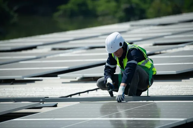 Close view of solar photovoltaic cells on a residential roof